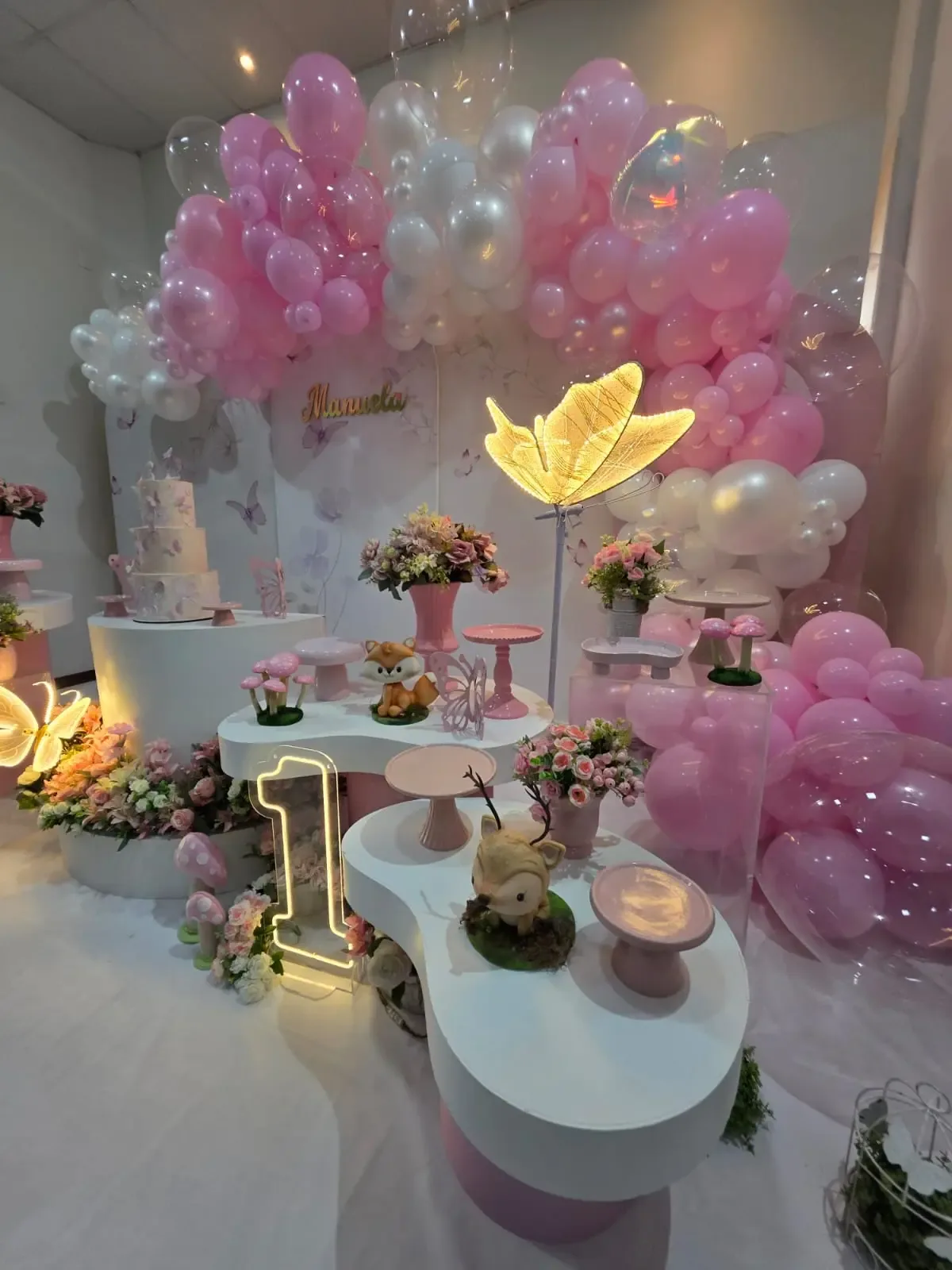 Festa com borboletas e tons rosados